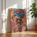 Colorful tapestry of a woman's profile on a wooden floor with a plant in the background African Woman Portrait