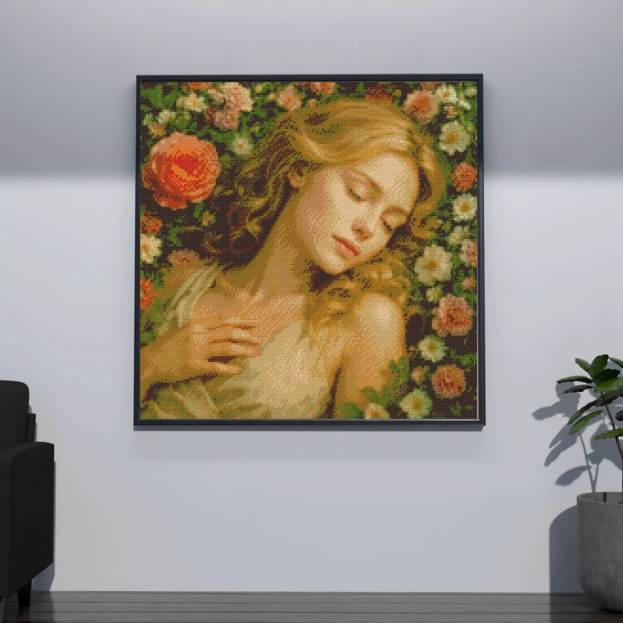 Framed artwork of a woman with flowers on a white wall Sleeping Beauty in Rose Garden | Diamond Painting Kit