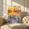 Snowy pier at sunset diamond painting kit, finished canvas on a cream sofa
