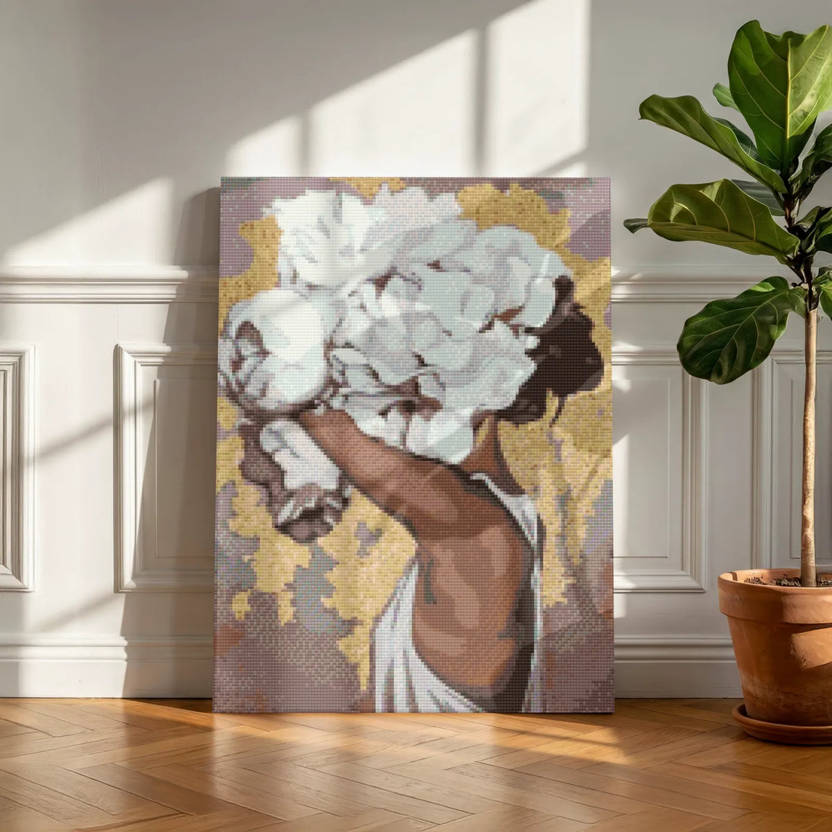 White peonies diamond painting on a portrait canvas in a panelled room beside a fig tree