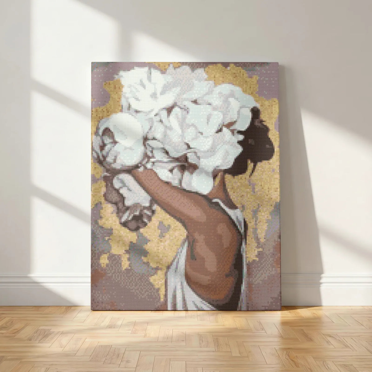 Veiled in White Peonies diamond painting kit, woman with white peonies on mauve and gold, canvas leaning on a white wall